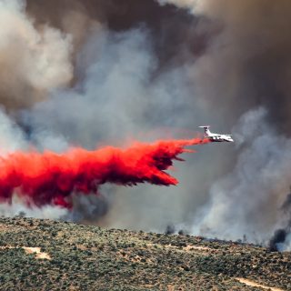 Fire suppression air dropped onto fire.