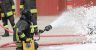 Firefighrer spraying AFFF foam