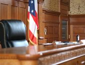 U.S. courtroom with flag