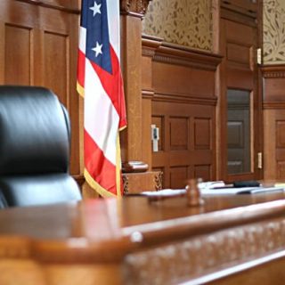 U.S. courtroom with flag