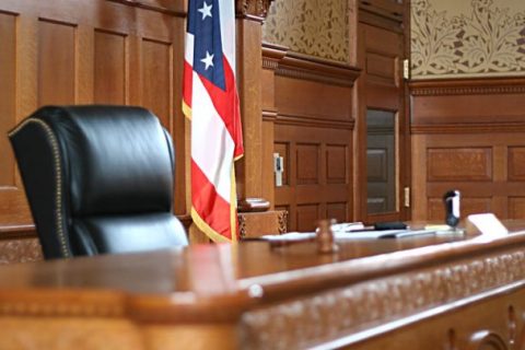 U.S. courtroom with flag