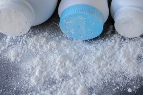 Three bottles of talcum powder